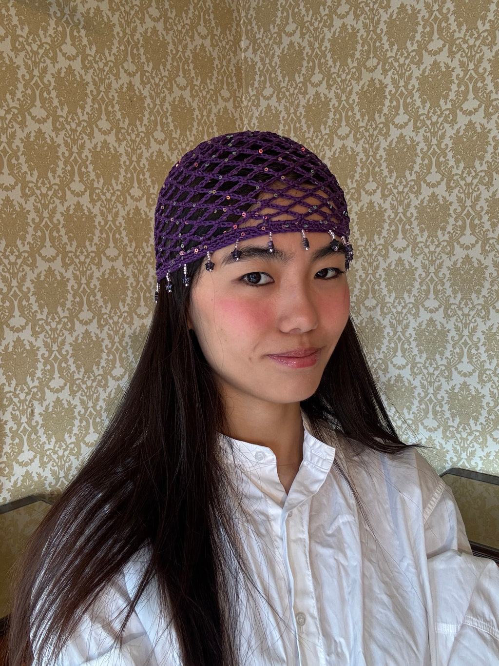 Crochet purple mesh hat with stars