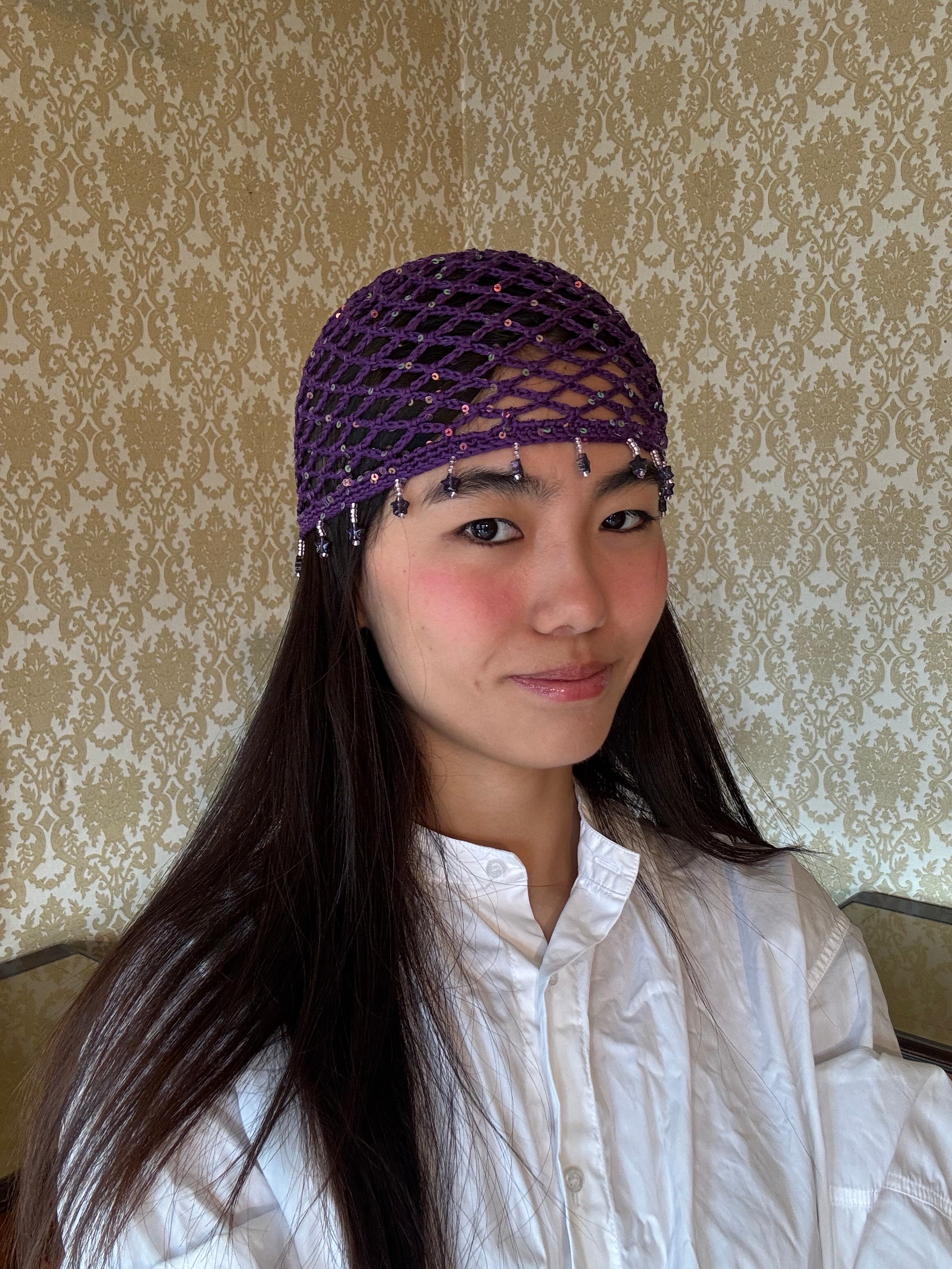 Crochet purple mesh hat with stars