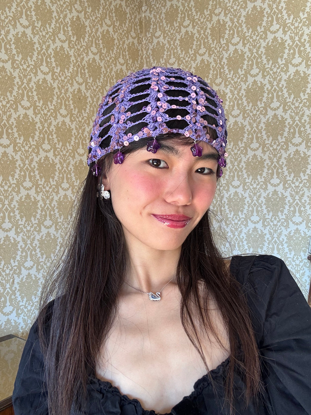 Purple mesh hat with stars