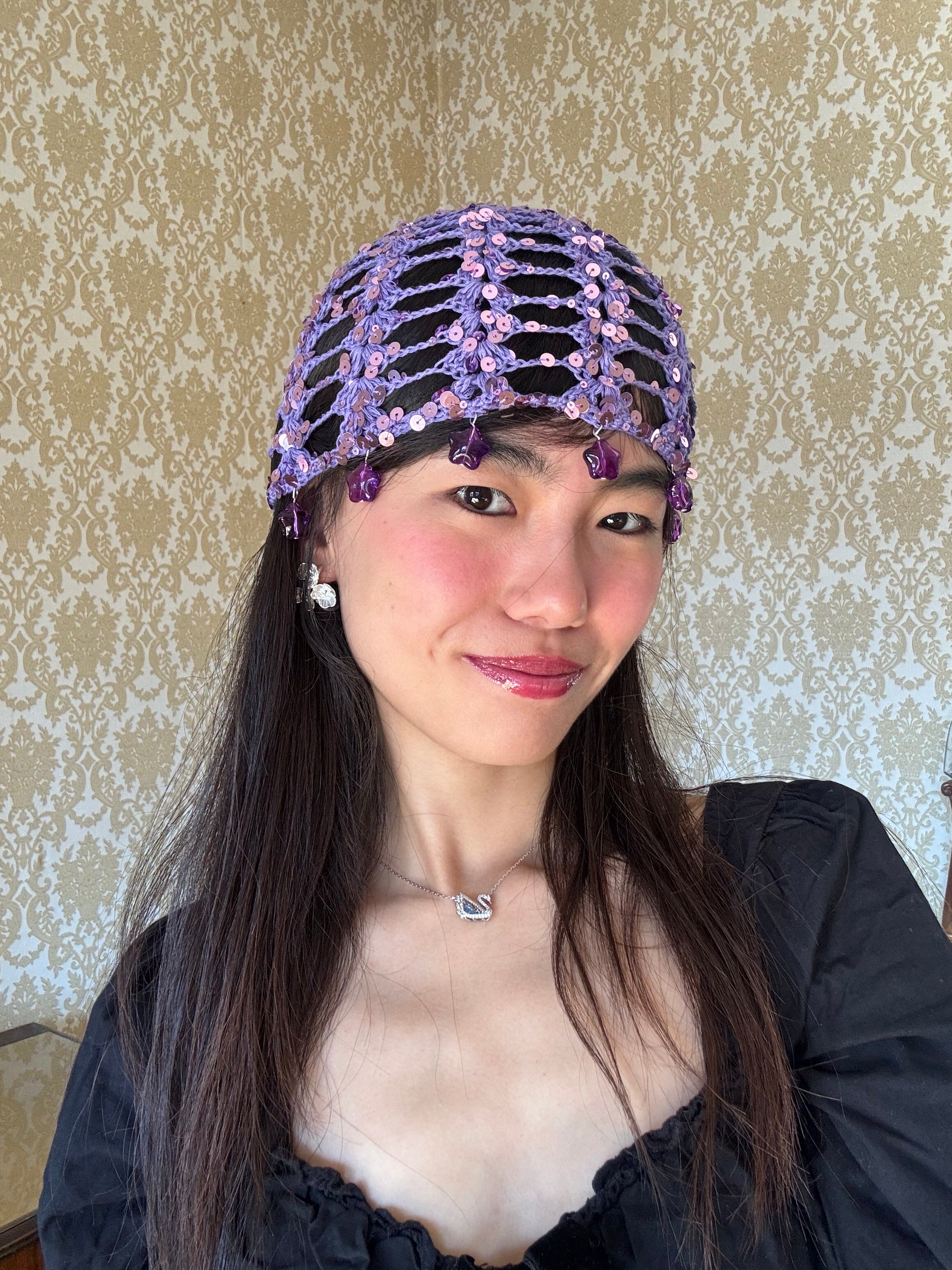 Purple mesh hat with stars