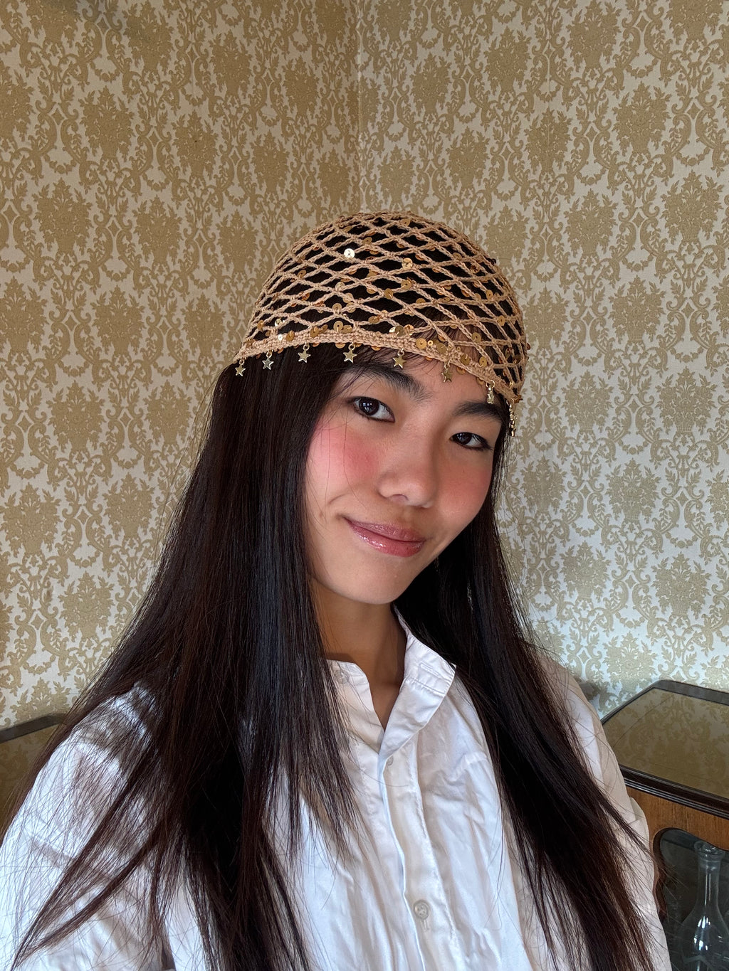 Crochet mesh hat with mini stars