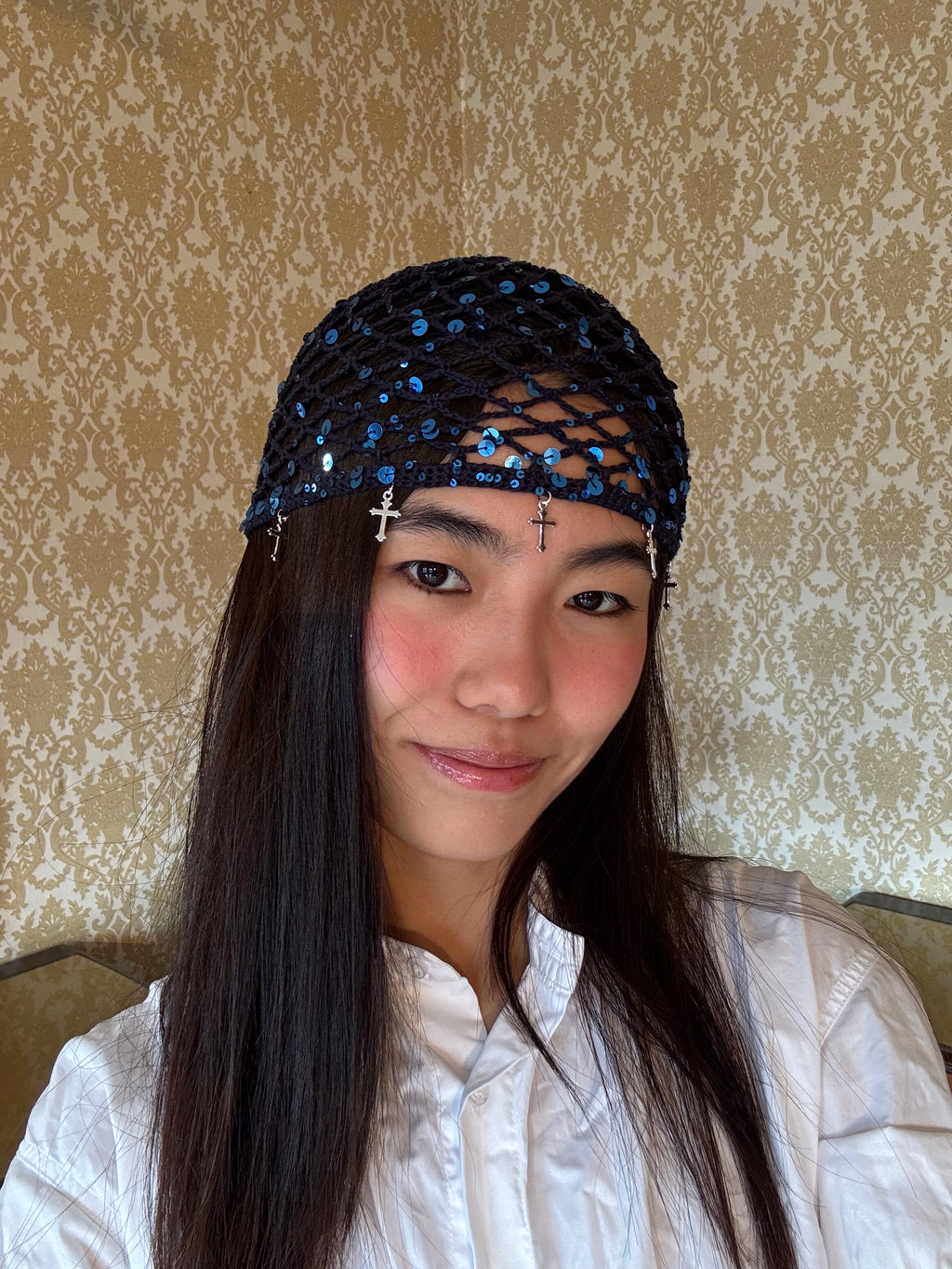 Crochet glittered mesh hat with cross