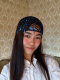 Crochet glittered mesh hat with cross