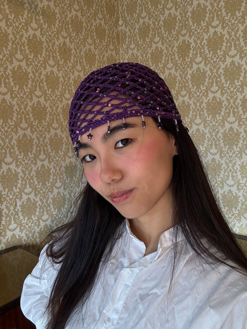 Crochet purple mesh hat with stars