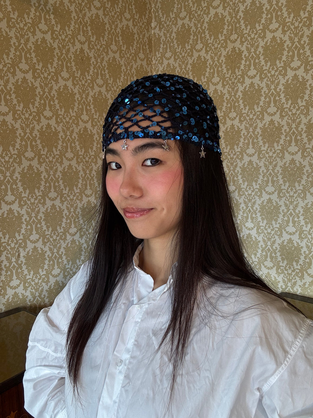 Crochet mesh hat with stars