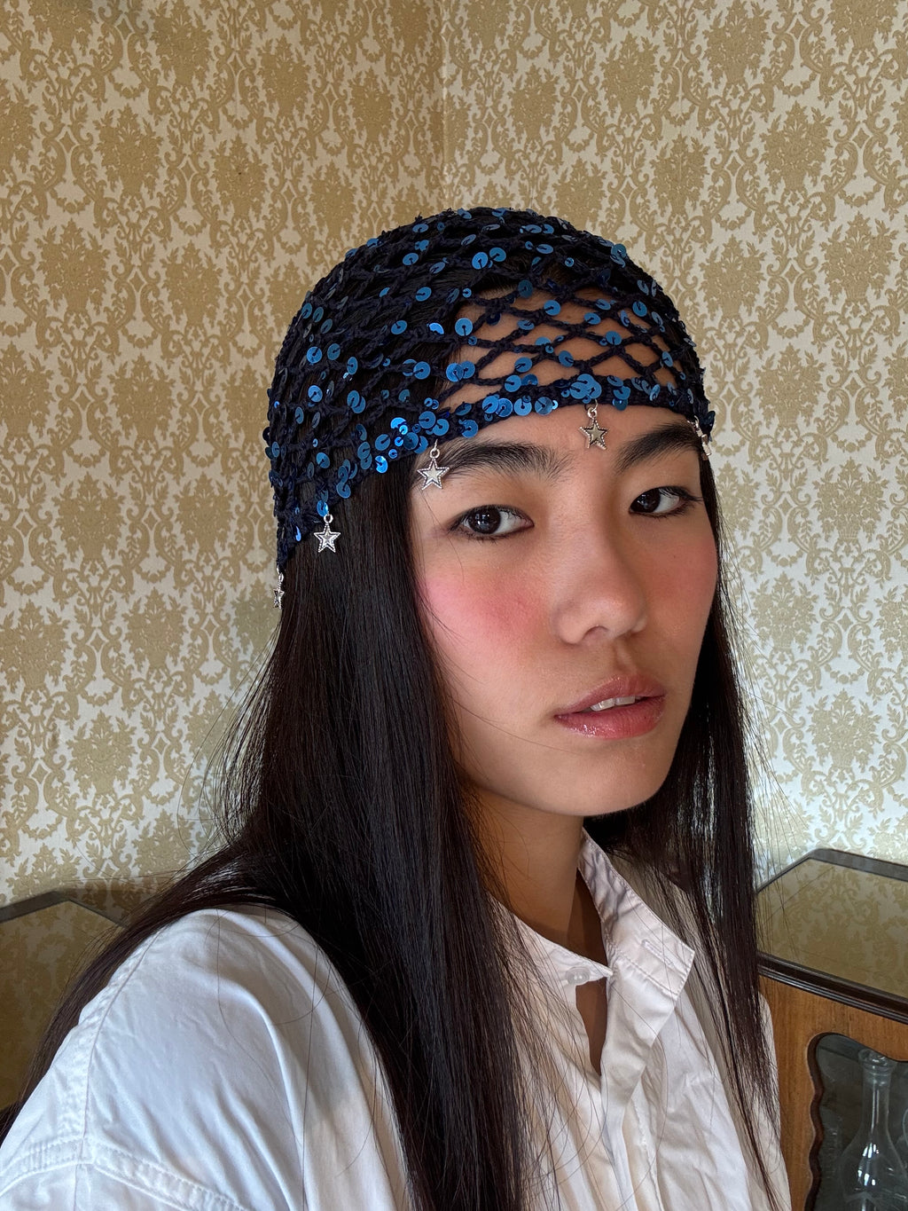 Crochet mesh hat with stars