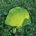 Crochet green mesh hat with butterflies