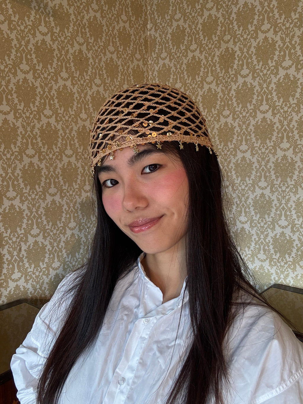 Crochet mesh hat with mini stars