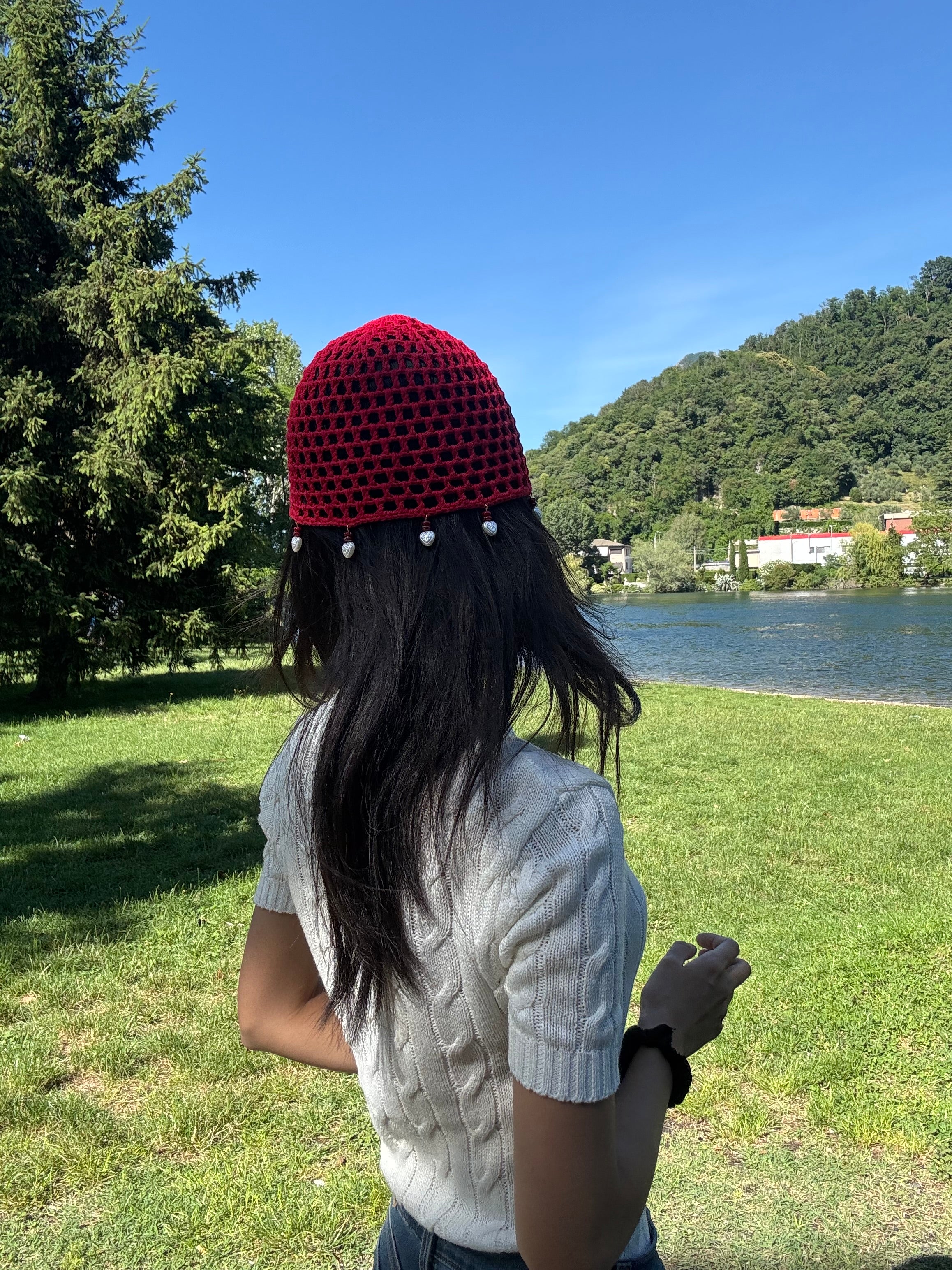 Crochet red mesh hat with hearts