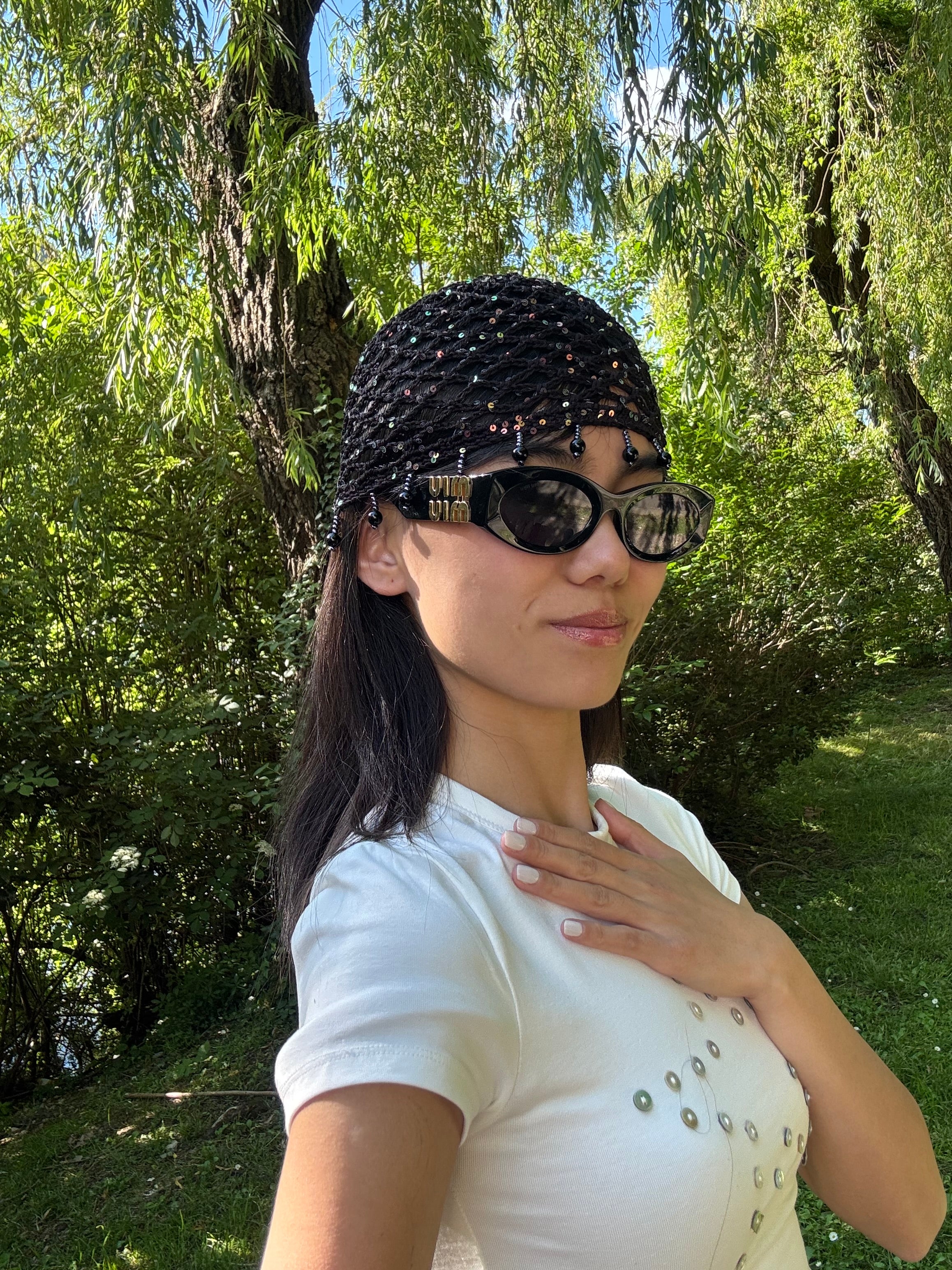 Crochet black mesh hat with charms