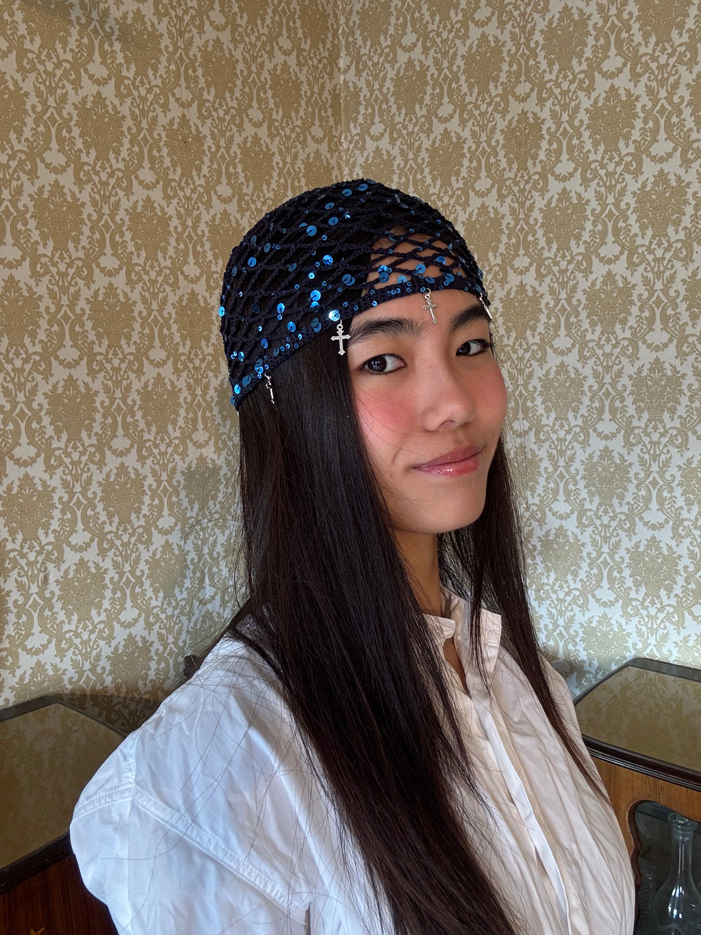 Crochet glittered mesh hat with cross