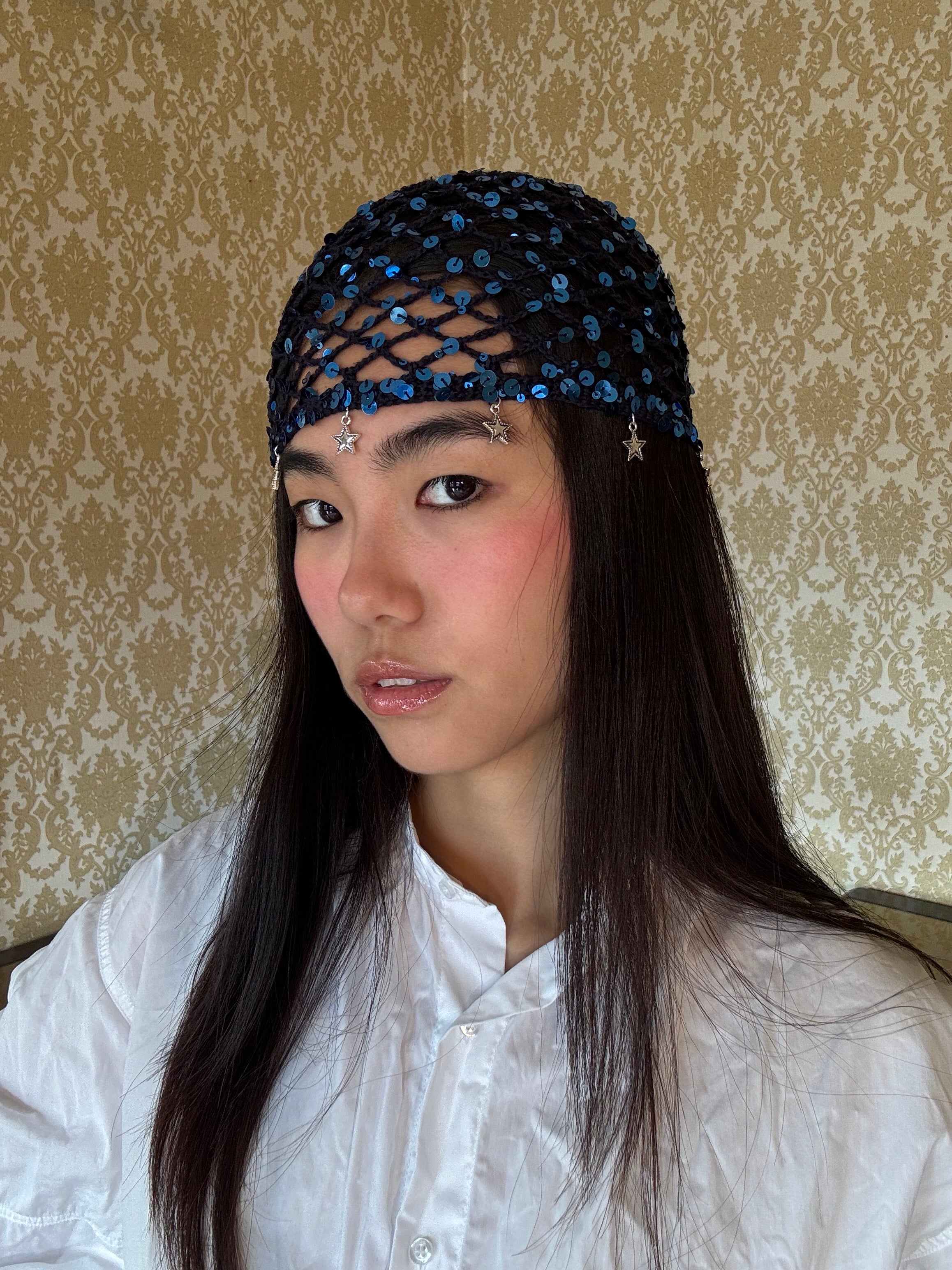 Crochet mesh hat with stars