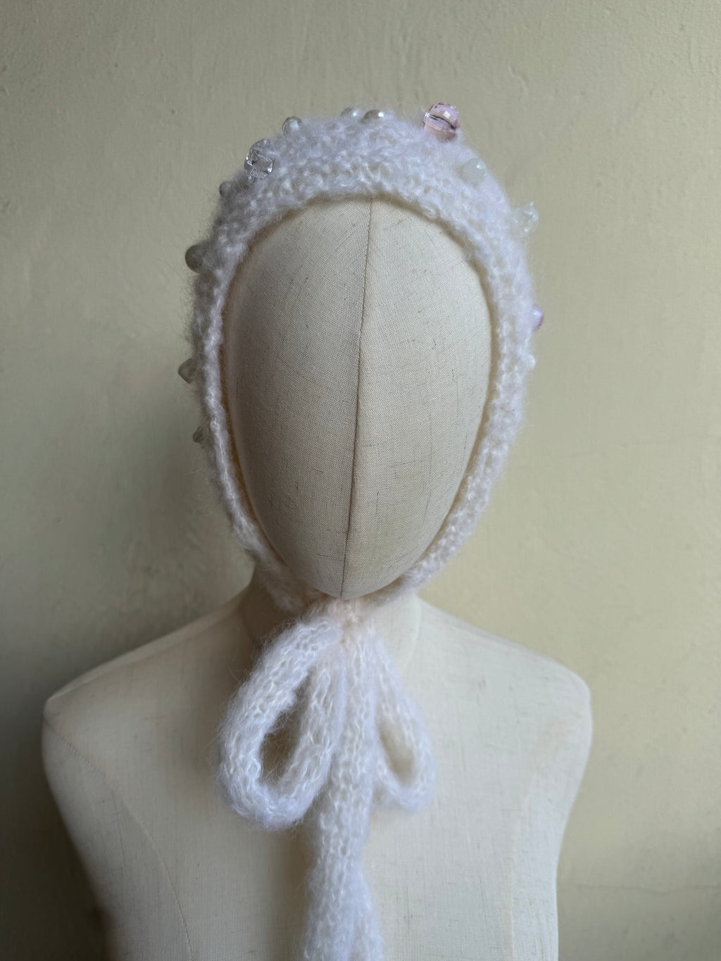 White bonnet with beads