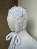 White bonnet with beads