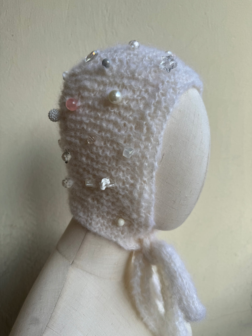 White bonnet with beads
