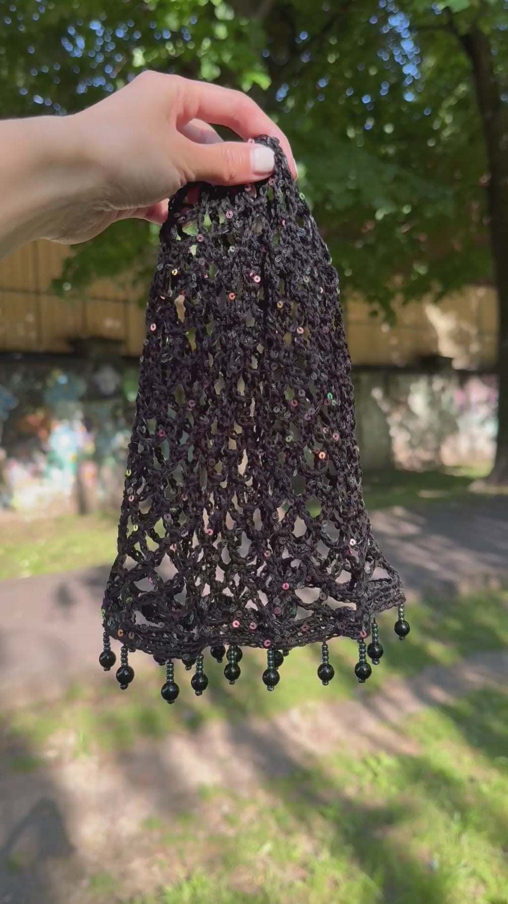 Crochet black mesh hat with charms